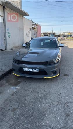 دۆج چارجەر